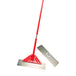 Red floor scraper with metal blades on a white background
