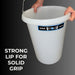 White bucket with a handle held by hands on a dark background, featuring a label.