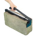Black metal lifting tool holding a grey breeze block