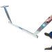 Mans stood holding long metal straight edge tool handles