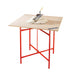 Red metal plastering table with top board and a dollop of plaster on top