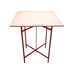 Red metal plasterers stand with wooden board  top