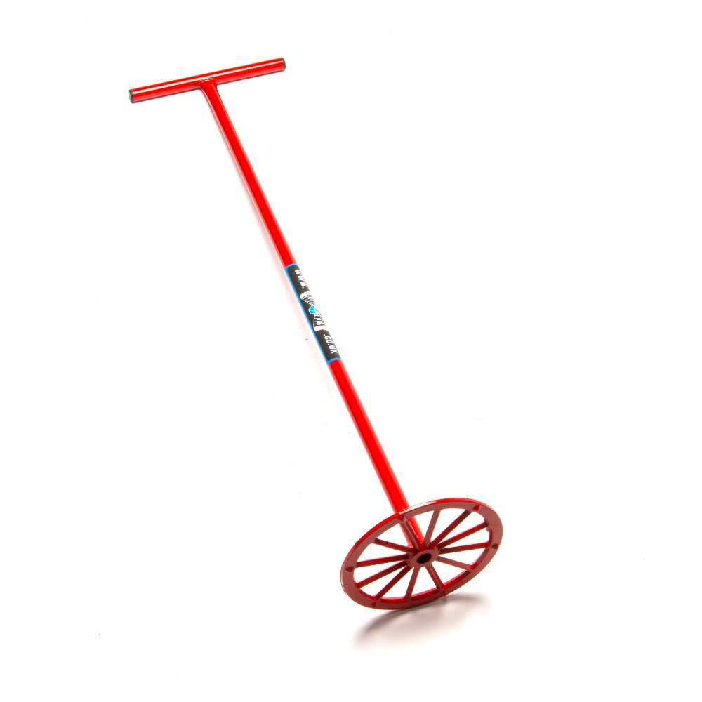 Red metal mixing wheel with long handle used for mixing plaster.
