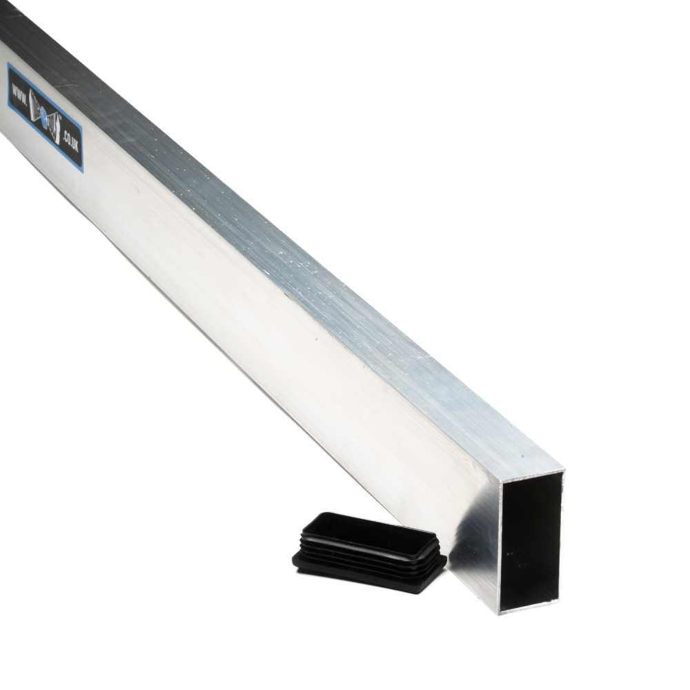 Rectangular steel section with black rubber inserts used for leveling concrete