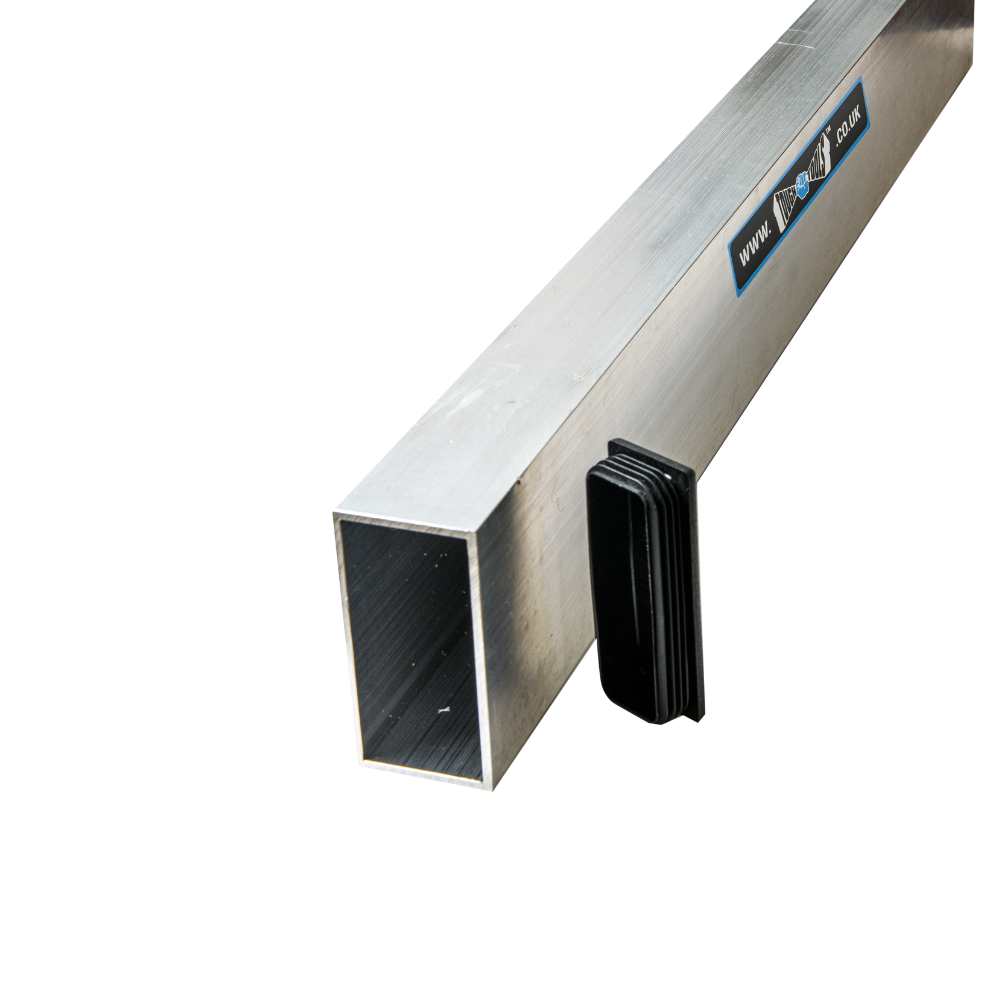Rectangular steel section with black rubber inserts used for leveling concrete